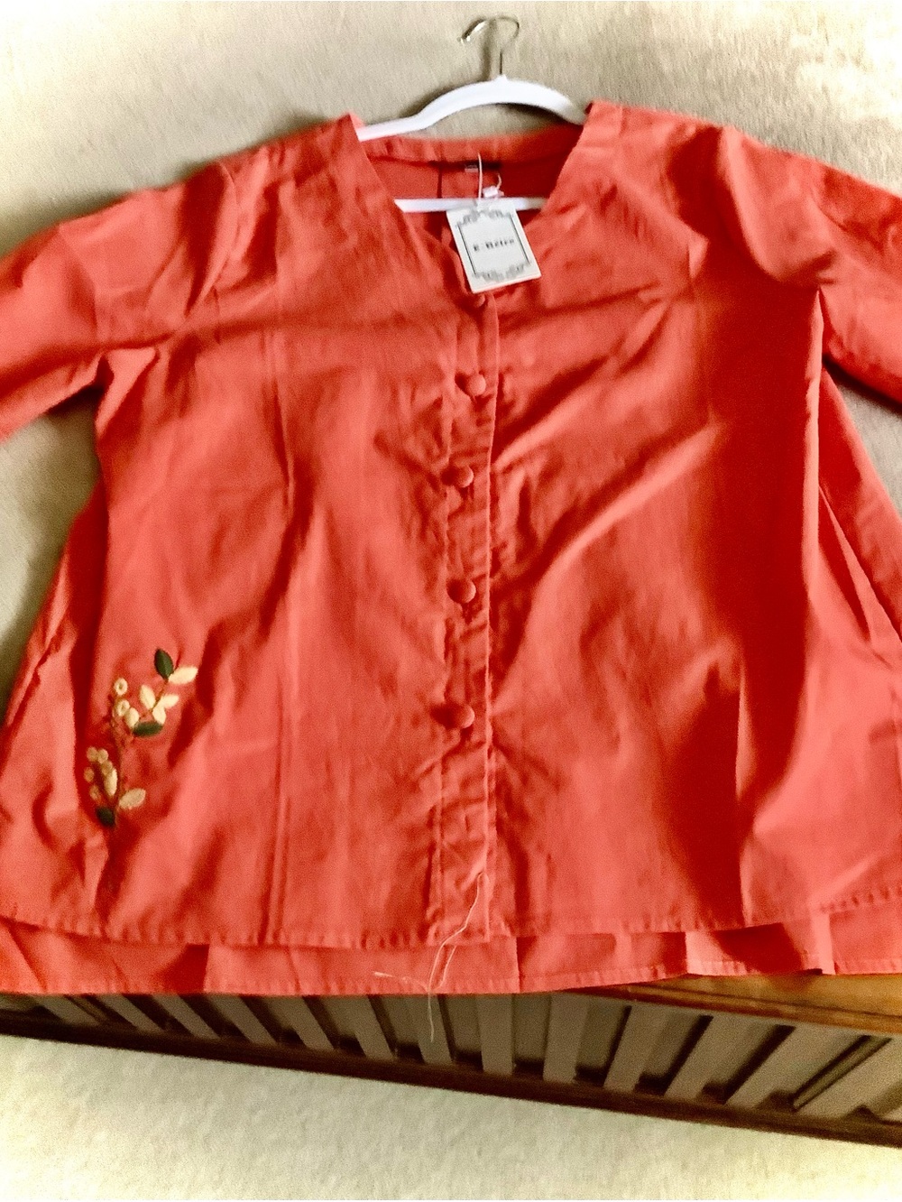 Coral Button-Front Top with Floral Accent